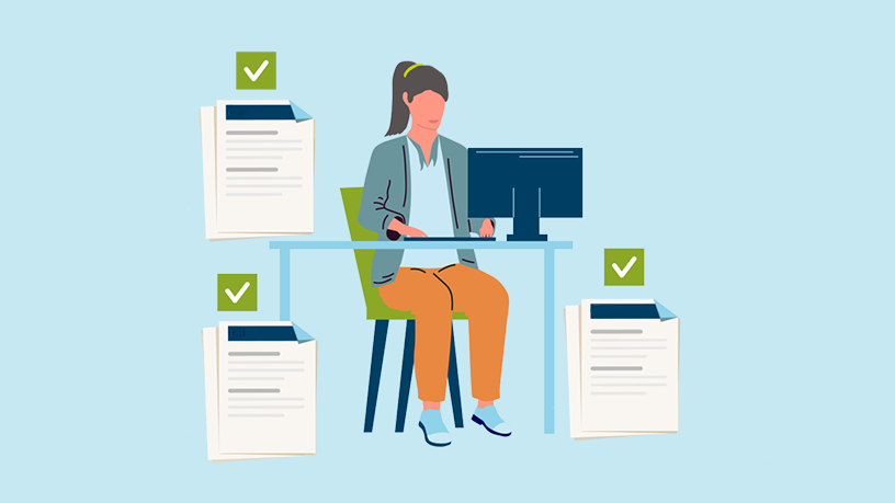 Person working at a desk with computer, surrounded by documents and check marks